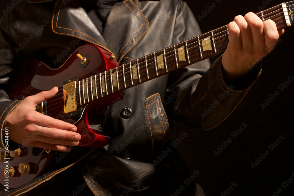 Fototapeta premium Romantic gothic boy playing guitar