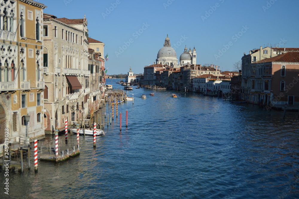 Wonderful Shot Of The Grand Canal From The Accademia Bridge With La Salute Church In The Background In Venice. Travel, holidays, architecture. March 28, 2015. Venice, Veneto region, Italy.
