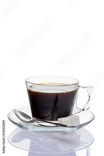 Black coffeein a glass cup on a white background.