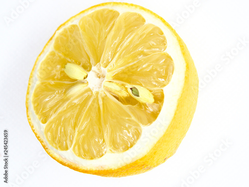Withered and half cul lemon on white background