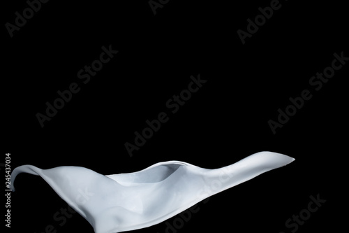 milk or white liquid splash on white background