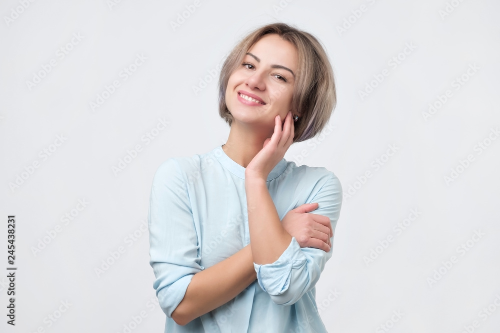 Portrait of a smiling attractive woman with short stylish haircut Portrait of a smiling attractive woman with short stylish haircut