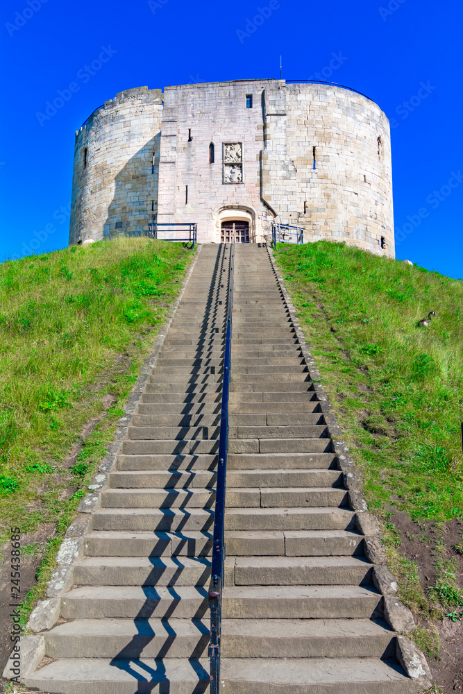 York, England, United Kingdom: Clifford's Tower, a fortified complex comprising of castles, prisons, law courts