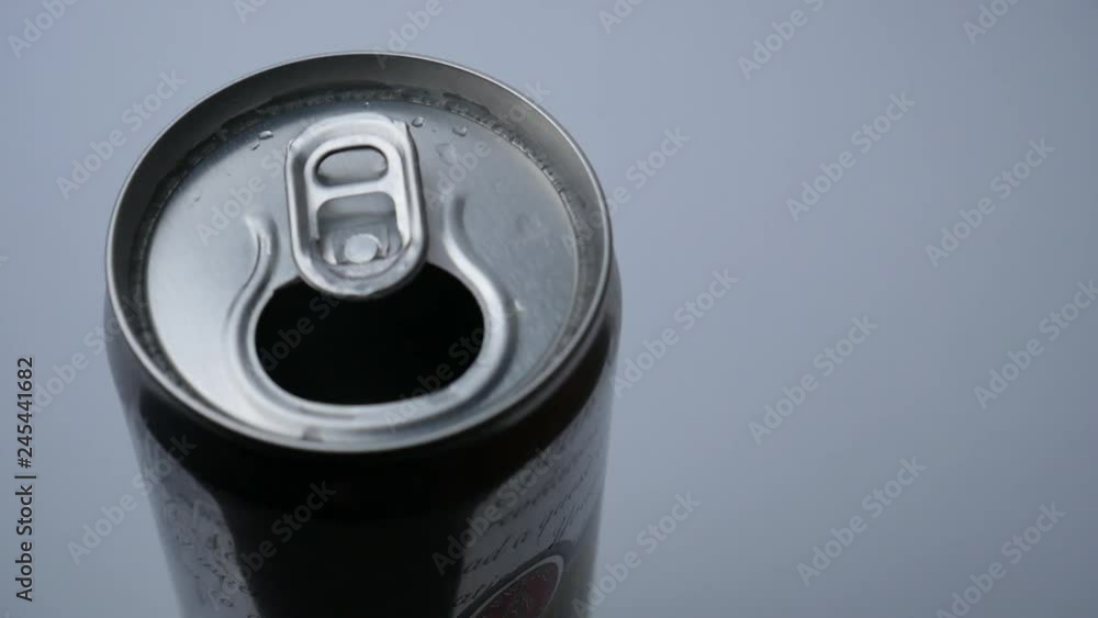 Soda can top. Metallic color. White background. Pan. Video footage Soda can top. Metallic color. White background. Pan. Video footage