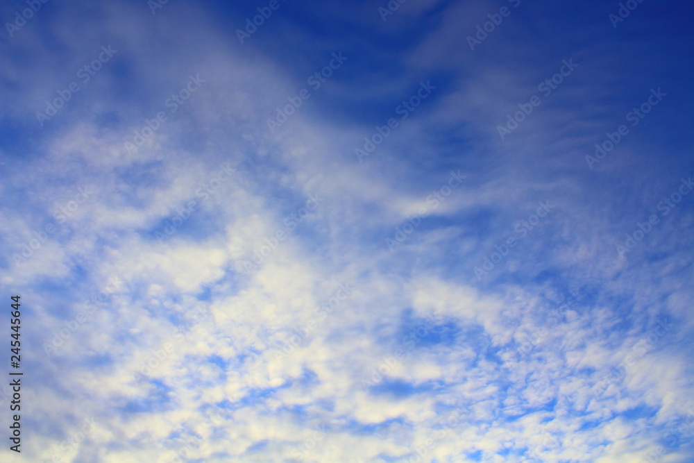Beautiful blue sky and white cirrus clouds. Background. Landscape.