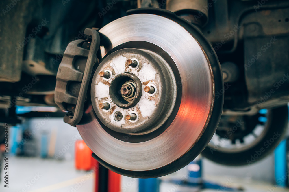 Ταπετσαρία Close up of car disc brake during the wheel tire change or repair
