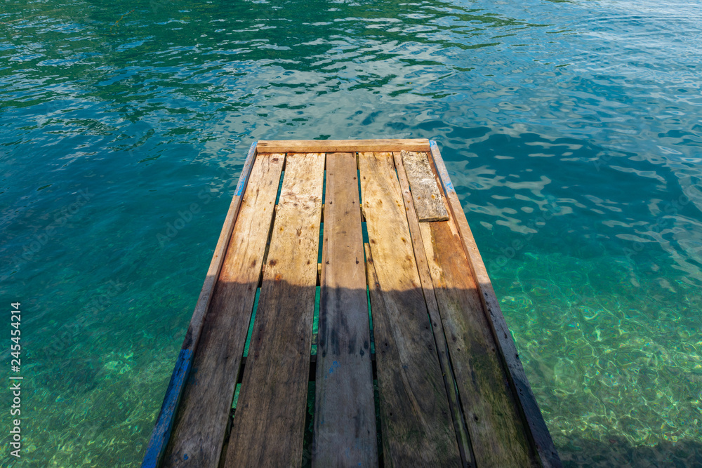 Pier wooden trestle in sulamadaha village ternate city Indonesia Pier wooden trestle in sulamadaha village ternate city Indonesia