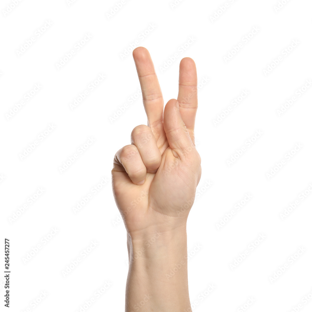 Man showing K letter on white background, closeup. Sign language Man showing K letter on white background, closeup. Sign language