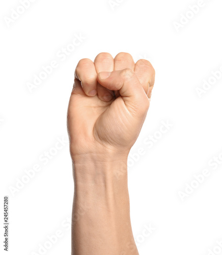 Man showing S letter on white background, closeup. Sign language