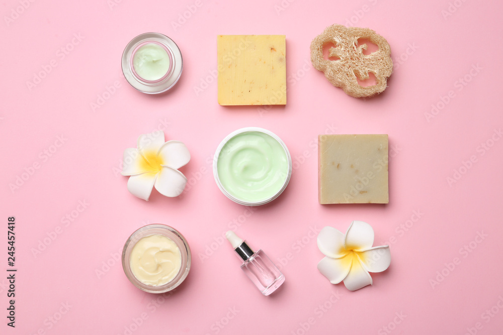 Flat lay composition with body care products on color background Flat lay composition with body care products on color background
