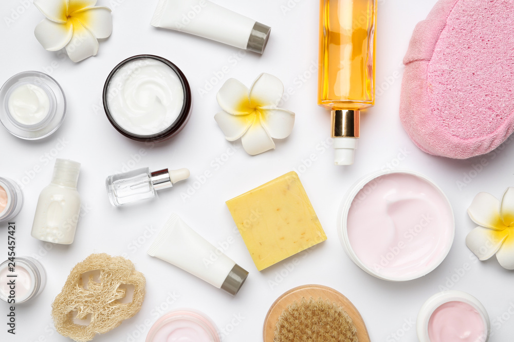 Flat lay composition with body care products on white background Flat lay composition with body care products on white background