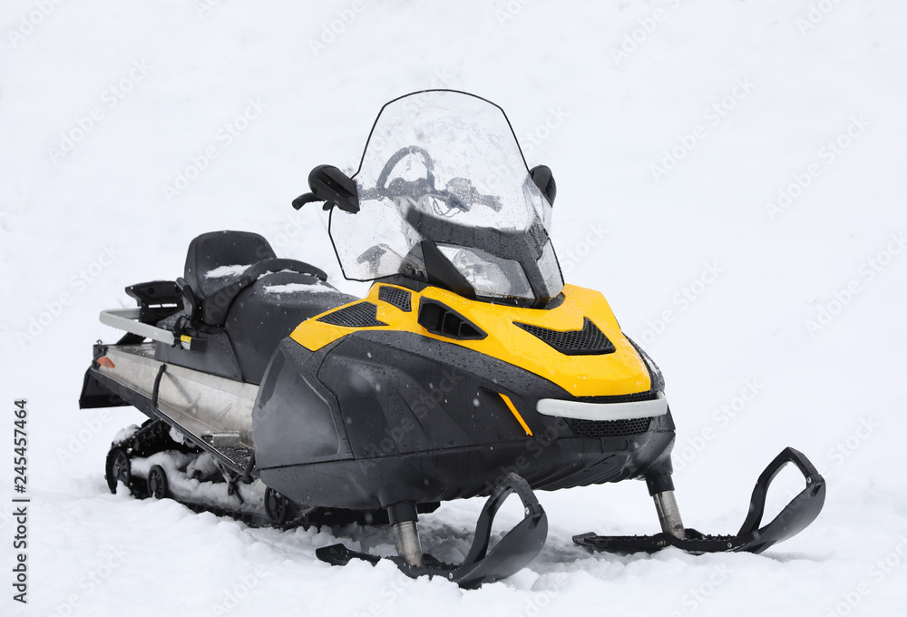 Ταπετσαρία New stylish snowmobile parked outdoors. Winter recreation