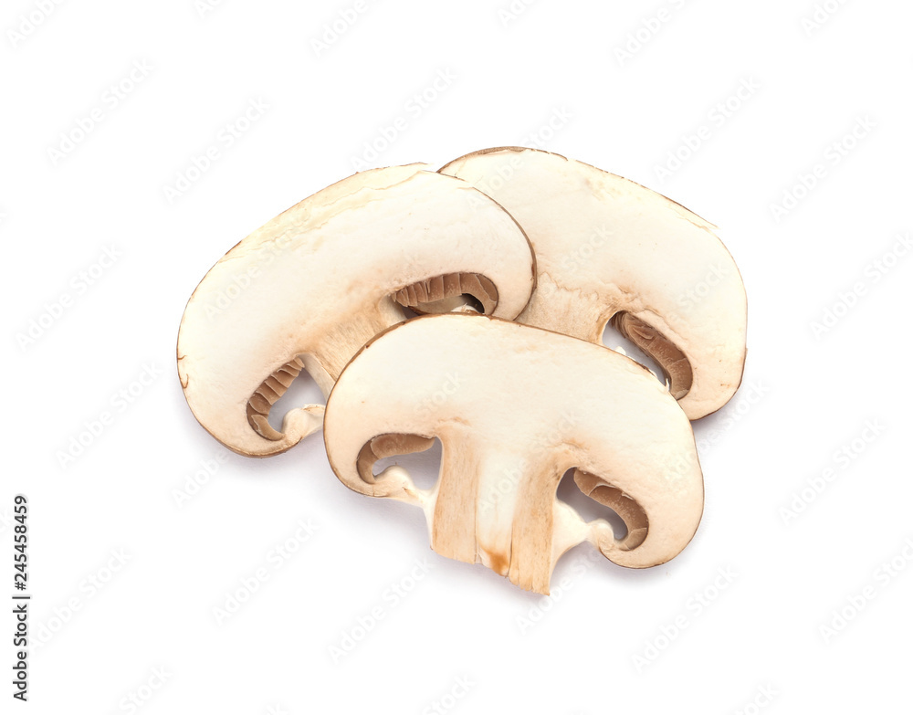 Fototapeta premium Slices of fresh champignon mushrooms on white background, top view