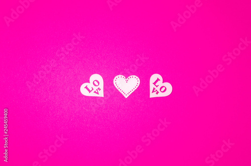 White wooden herarts on the pink background. Valentines day collage photo