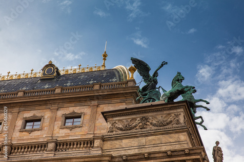 Photography Detail of the National Theatre building and Prague city old town