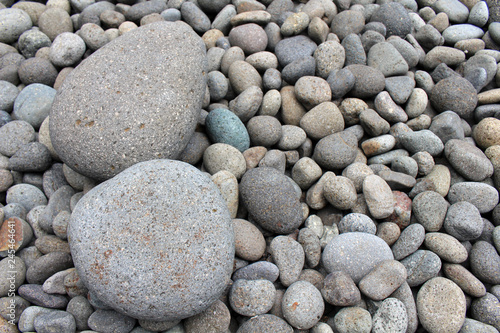 Big stones among smaller pebbles, in the garden