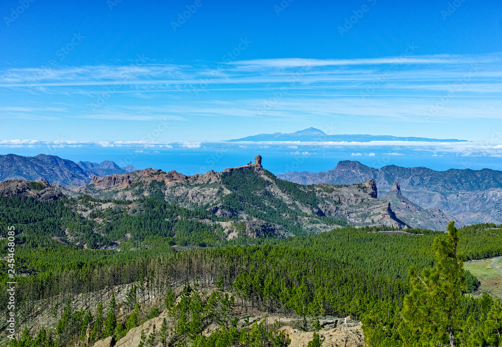 Gran Canaria island mountains landscape, view from highest peak Pico de las Nieves to Roque Nublo and Mount Teide on Tenerife