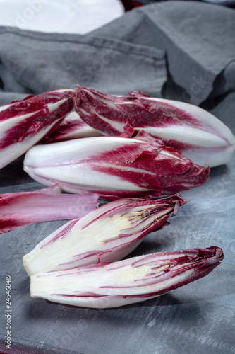 Group of fresh red Radicchio chicory or Belgian endive vegetables, also known as witlof salade