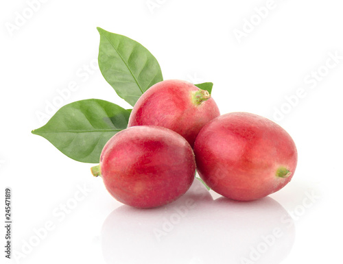 fresh coffee beans with leaf on white background