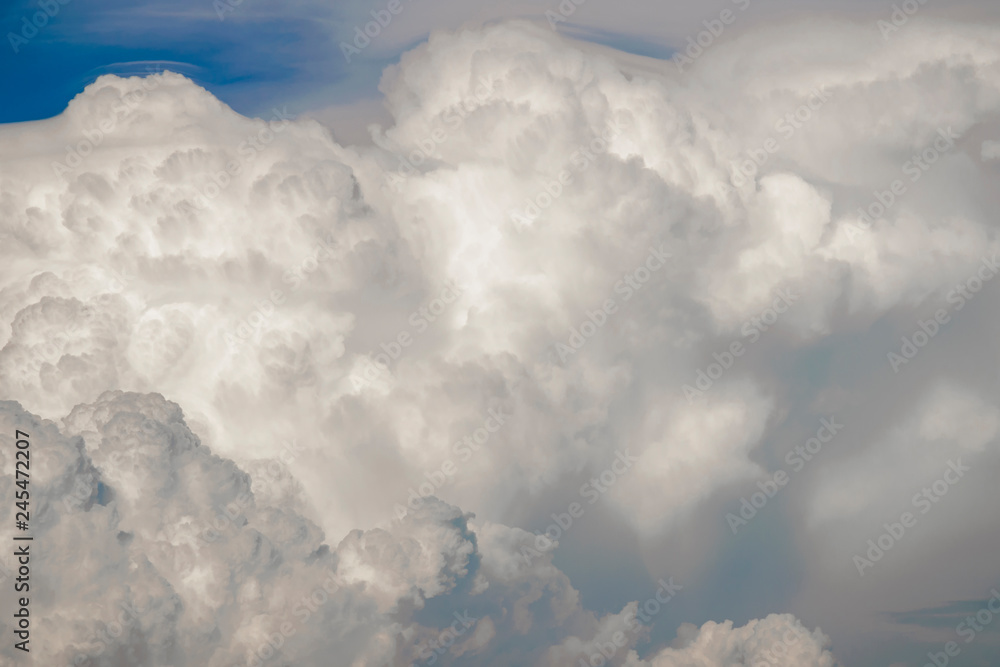 Blue sky with white clouds, clear blue sky with plain white cloud with space for text background Blue sky with white clouds, clear blue sky with plain white cloud with space for text background