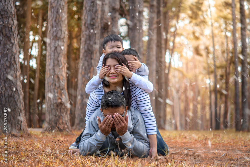 Young family with children having fun in nature Young family with children having fun in nature