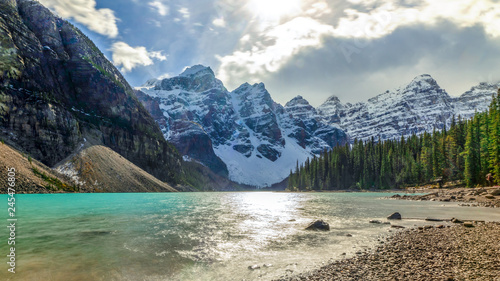 Green placid Maraine Lake at noon