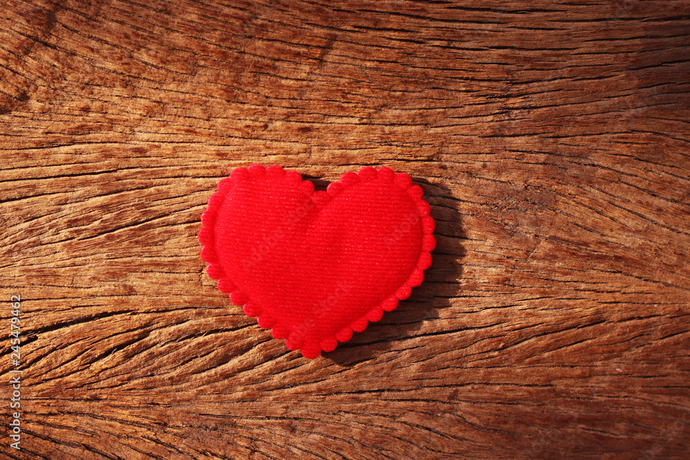 Abstract red heart shape on wood wall texture background symbol of love for Valentine and wedding day Abstract red heart shape on wood wall texture background symbol of love for Valentine and wedding day