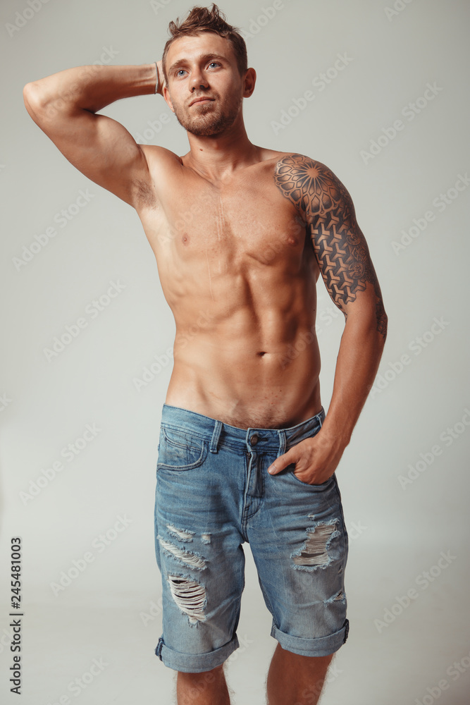 Semi naked man on white background Semi naked man on white background
