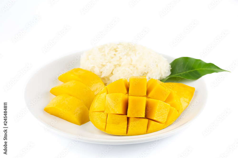 yellow Mango with sticky rice on a white plate Isolated on white background