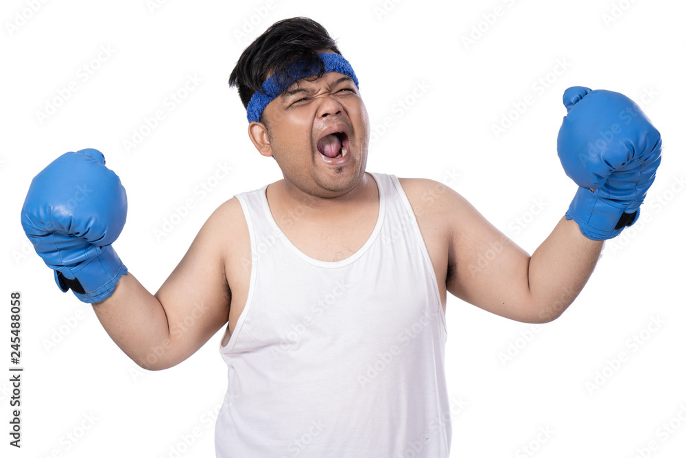 portrait of expression young man with boxing gloves hands up
