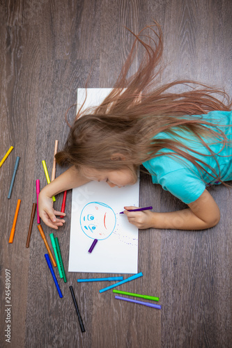 girl draws sadness
