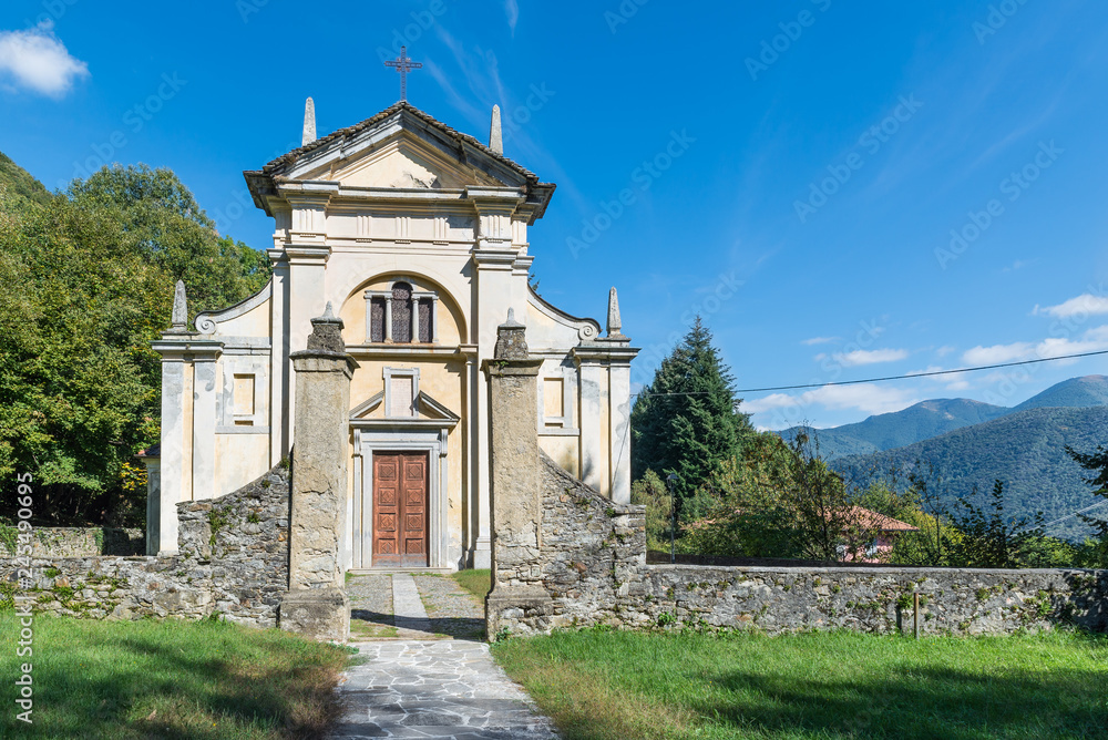 Naklejka premium Lake Maggiore, Italy. Art, history and nature around the lake. Church of San Martino Vescovo (12th century) in Campagnano village above Maccagno town in Veddasca valley