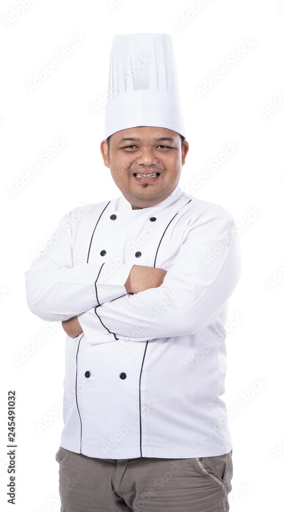 portrait of young asian chef smile and pose crossed hands look at the camera