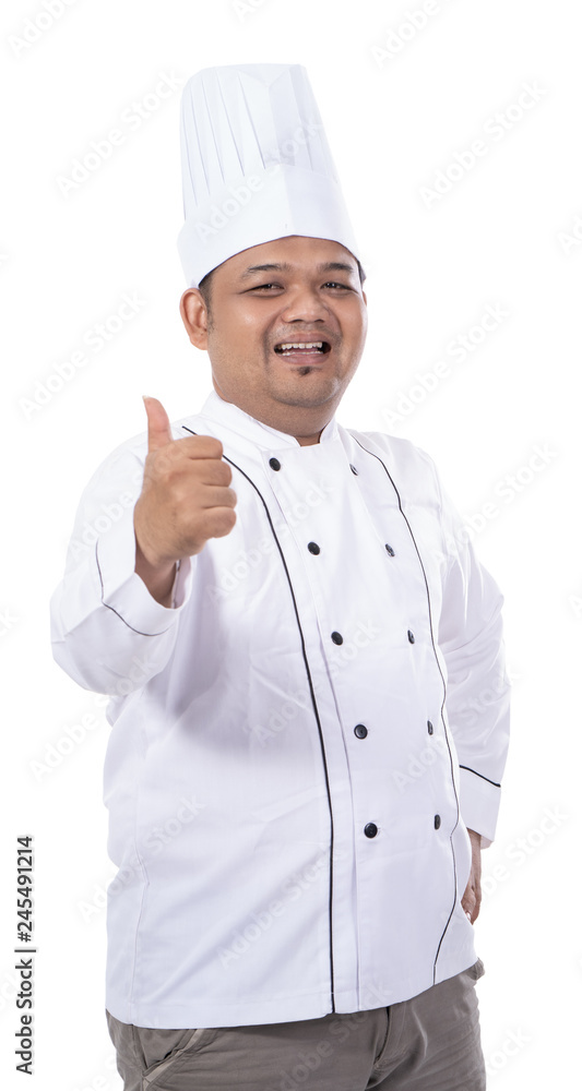 portrait of young asian chef smile while hand thumb up portrait of young asian chef smile while hand thumb up