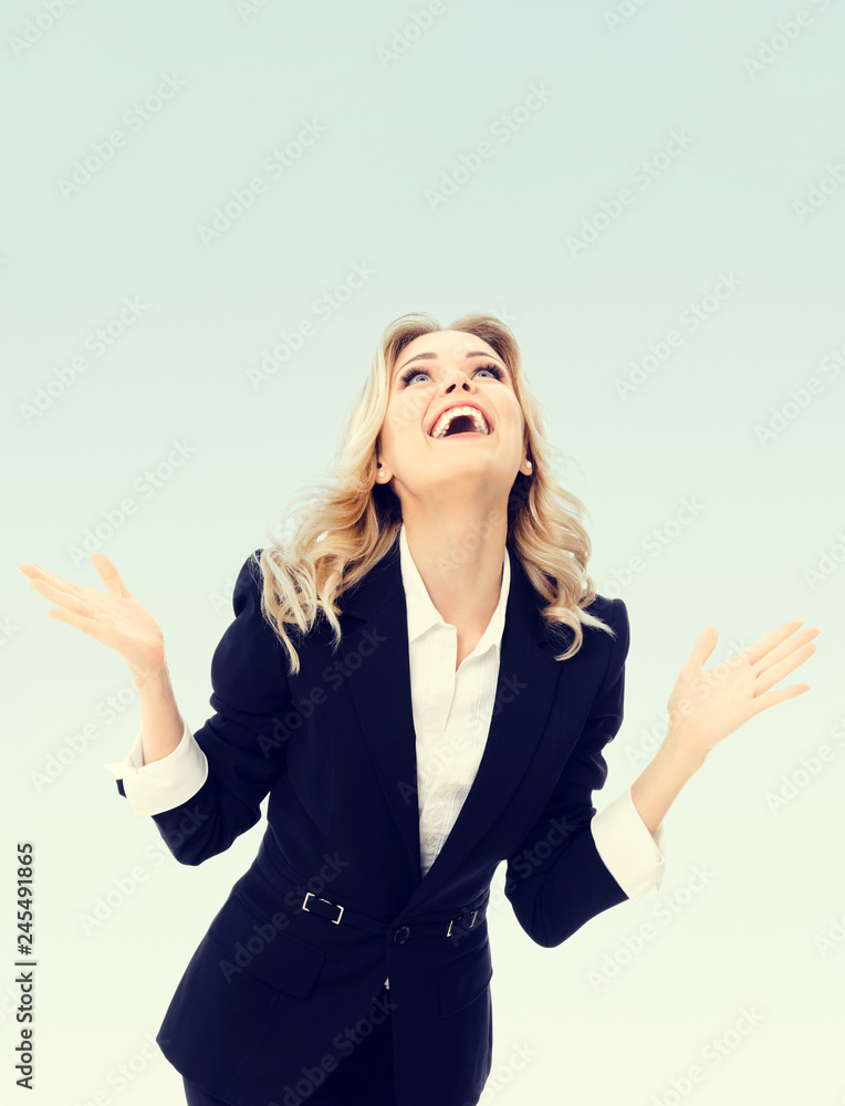 Happy gesturing young cheerful businesswoman Happy gesturing young cheerful businesswoman