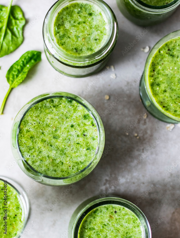 Fresh green smoothie in glasses