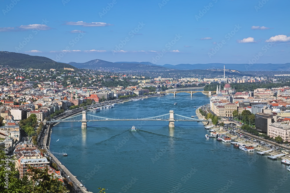 Budapest, Hungary. View from Gellert Hill to Danube river with Szechenyi Chain Bridge and Margaret Bridge, and Hungarian Parliament Building.