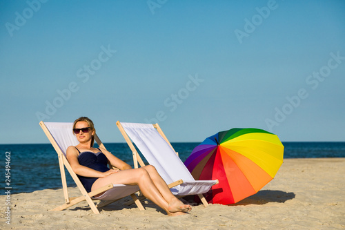 Woman relaxing on beach © Jacek Chabraszewski
