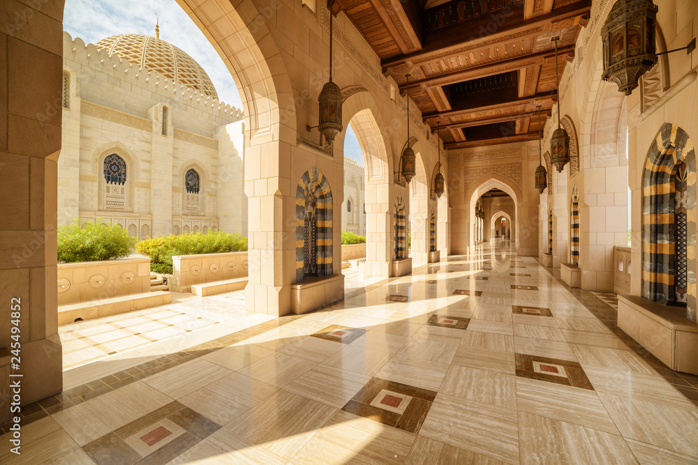 Deserted arched passageway, the Sultan Qaboos Grand Mosque, Oman