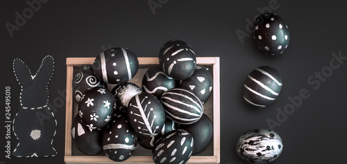 Easter composition with eggs in a wooden box photo