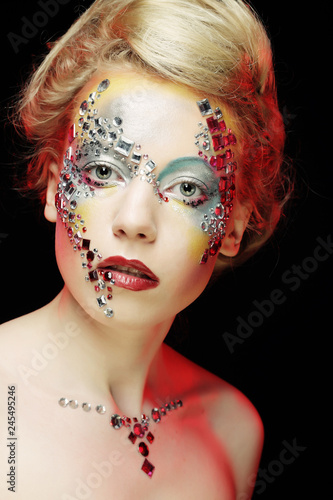 Closeup portrait of woman with artistic make-up