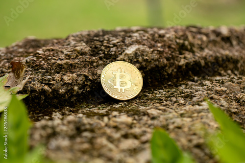 gold coin, silver coin, on a green, blue, black background. cryptocurrency. photo