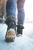 Girl is walking on snow, wintertime, cutout