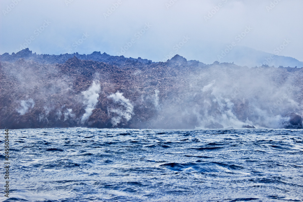 Hot Volcanic Lava Ffalls Into Sea.
