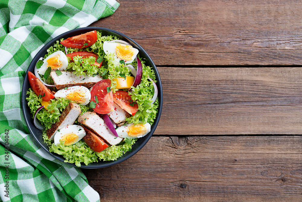 Fresh vegetable salad with chicken breast and eggs. Fresh vegetable salad with chicken breast and eggs.