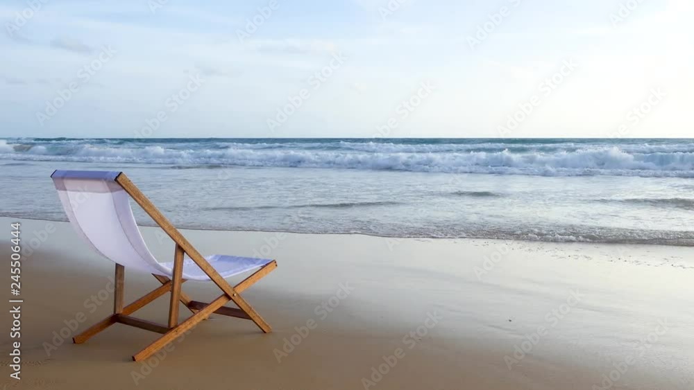 White chair on Katanoi beach, Phuket, Thailand White chair on Katanoi beach, Phuket, Thailand