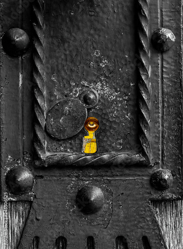 All seeing eye is peeking from the keylock photo