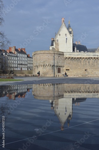 Nantes medieval castle reflecting in the water