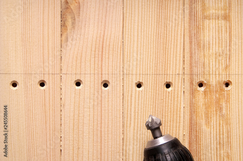 countersink bit in the drill holes machined countersink in wooden workpieces