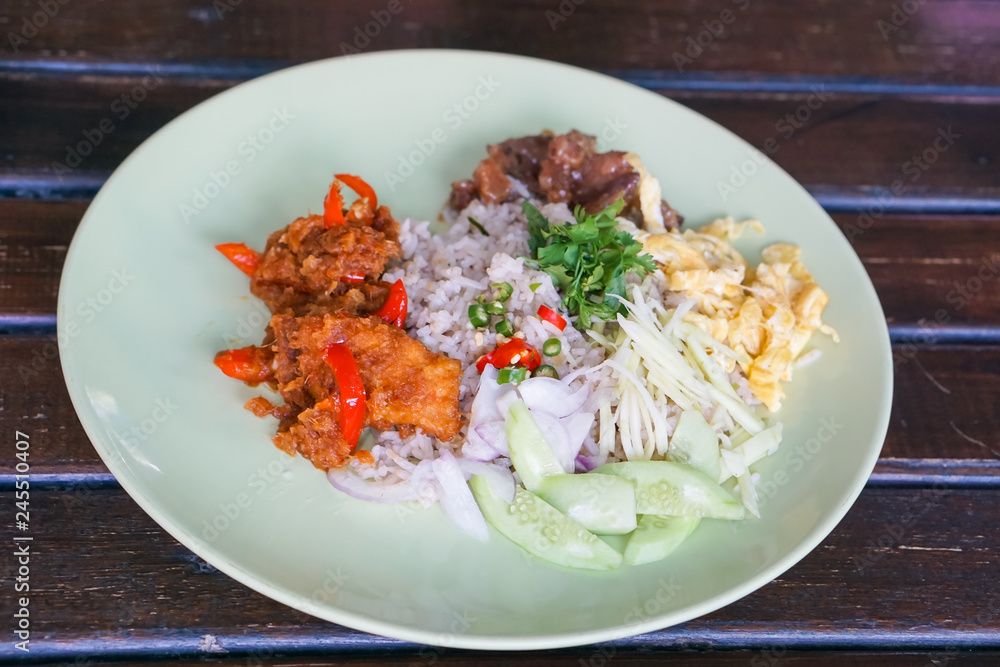 Rice Seasoned with Shrimp Paste, and Fried Fish curry.